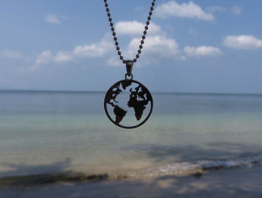 Silver world map pendant for travel lovers